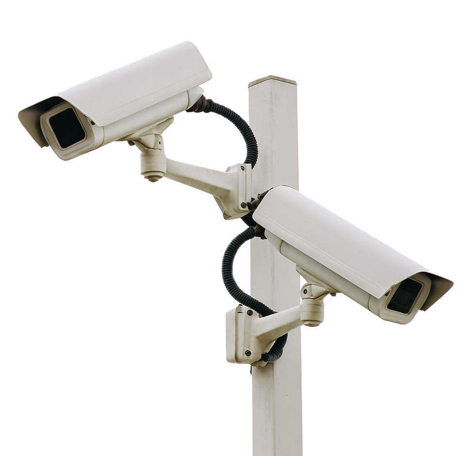 Two white security cameras mounted on a pole against a plain gray sky.